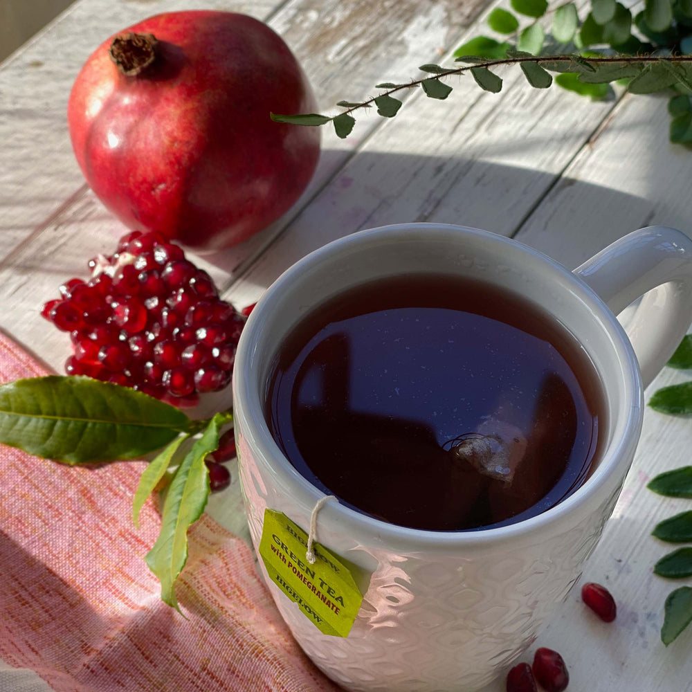 Cup of Green Tea with Pomegranate