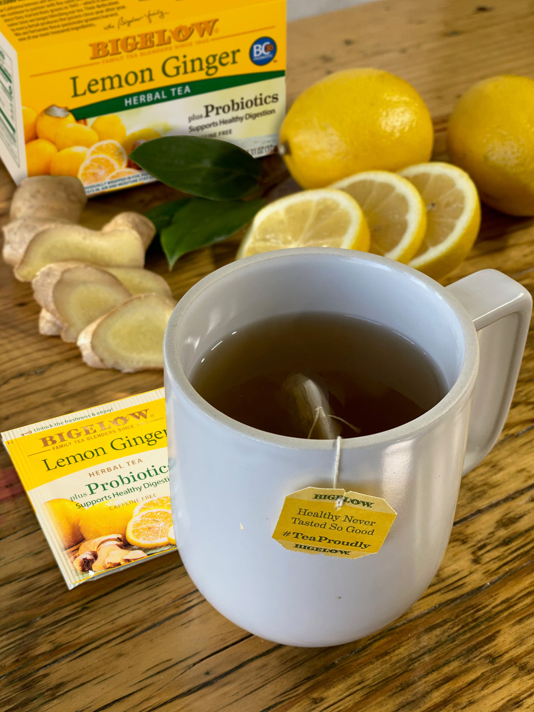 Cup and box  of Lemon Ginger Plus Probiotics Herbal Tea