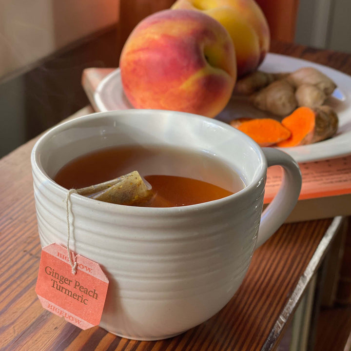 Cup of Ginger Peach Turmeric Herbal Tea